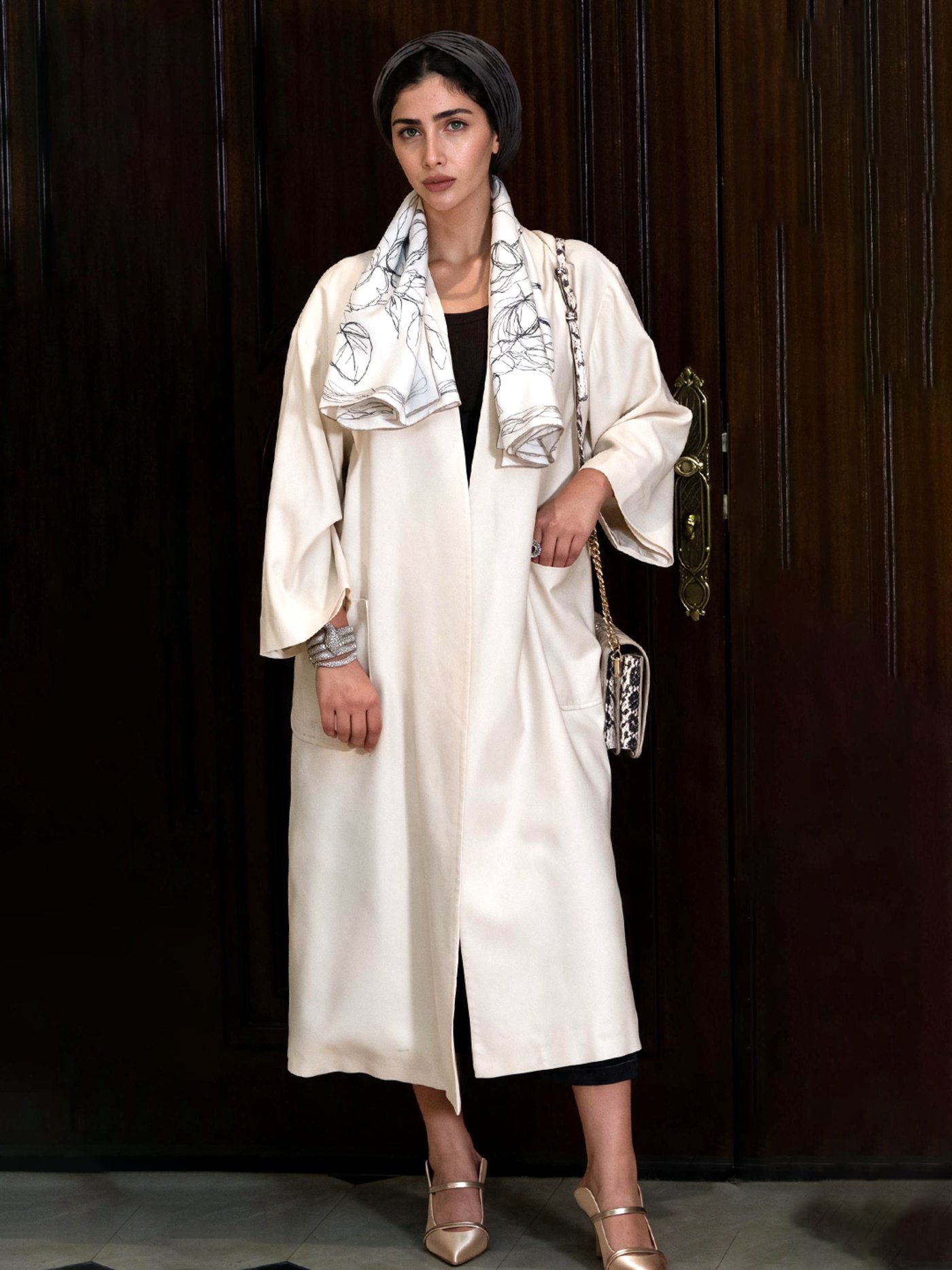 The Everyday Luxury Coat styled with a printed silk scarf